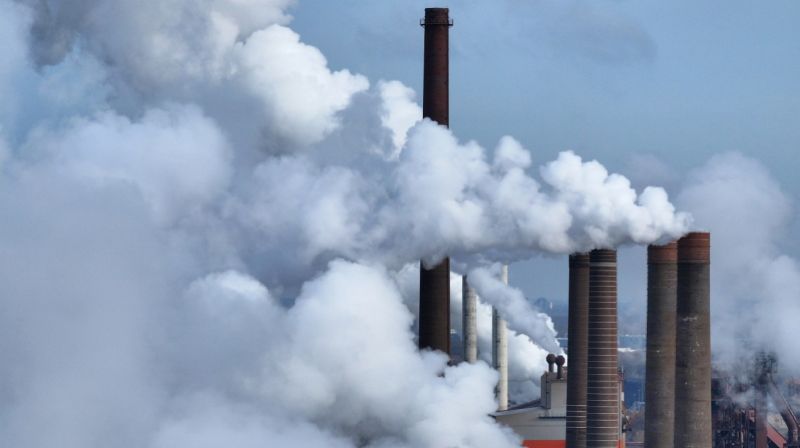 Water vapor and exhaust rise from the steel mill of Salzgitter AG, one of Europe's largest steel producers in Salzgitter, Germany. The company is investing heavily towards CO2-free steel production.