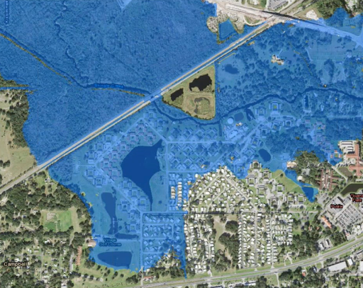 n this example FIM Services map, blue shading marks the areas of a neighborhood in Campbell, Florida projected to experience river flooding over the next five days, including many houses and businesses.