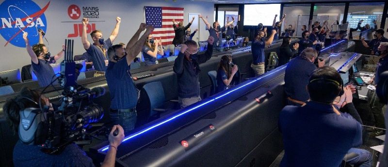 Mission Control Center at JPL for the NASA's Mars 2020 Mission. The mission control team is shown cheering the success of the Rover vehicle touchdown on Mars on February 18, 2021.