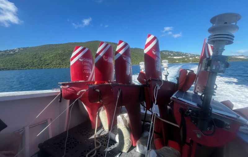 Four Oshen C-Stars departing St. Thomas on the back of a deployment vessel for future observations of Atlantic hurricanes.