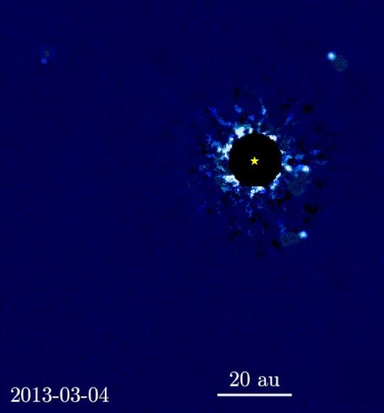 Four exoplanets of the HR 8799 system imaged by the W. M. Keck Observatory. The black circle is the occulting mask used to block the glare from the star.