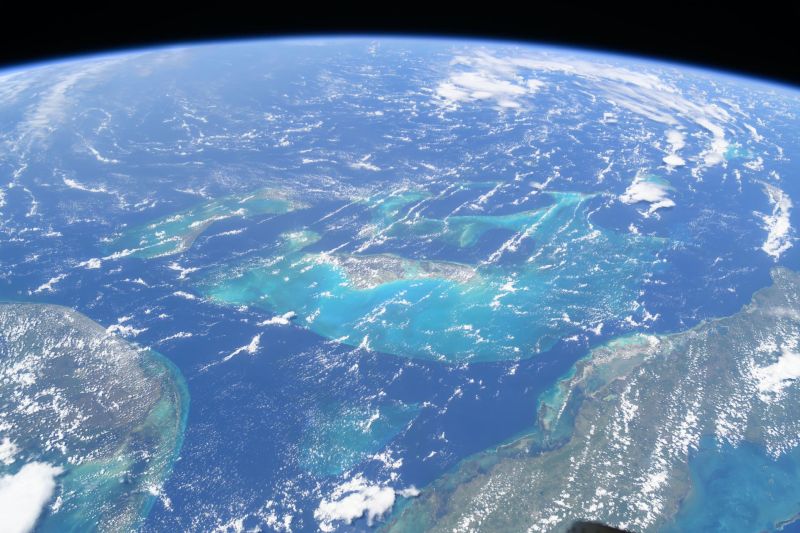 This image of the Atlantic Ocean around Florida, the Bahamas, and Cuba was taken from the International Space Station in 2024. Coastal areas are particularly vulnerable to sea level rise. A NASA analysis shows that the global mean sea level rose 0.03 inches (0.08 centimeters) in 2025.