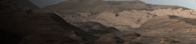 A composite view of Martian surface taken by Curiosity and showing mineral deposits.
